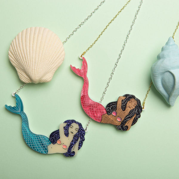 sugar-and-vice-mermaid-necklaces-brown-with-pink-tail-and-white-with-blue-tail