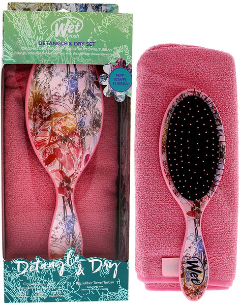 detangle brush in box with pink towel