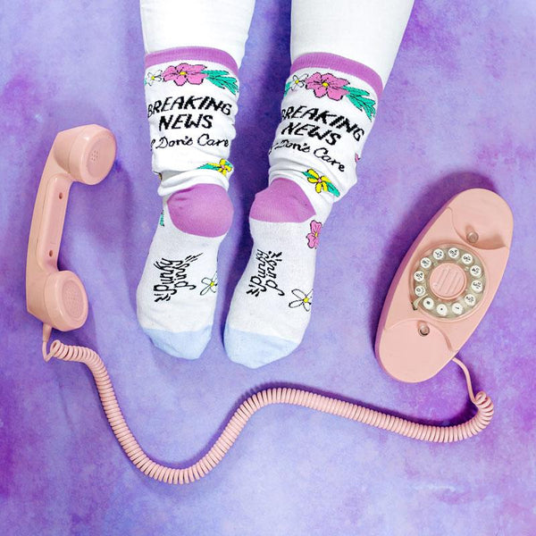 breaking news I don't care socks with phone